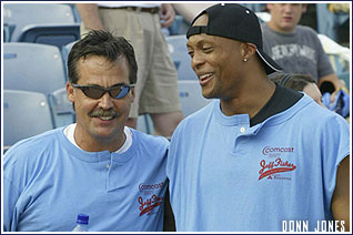 Jeff Fisher cracks a joke with Eddie George before trying to kill him.